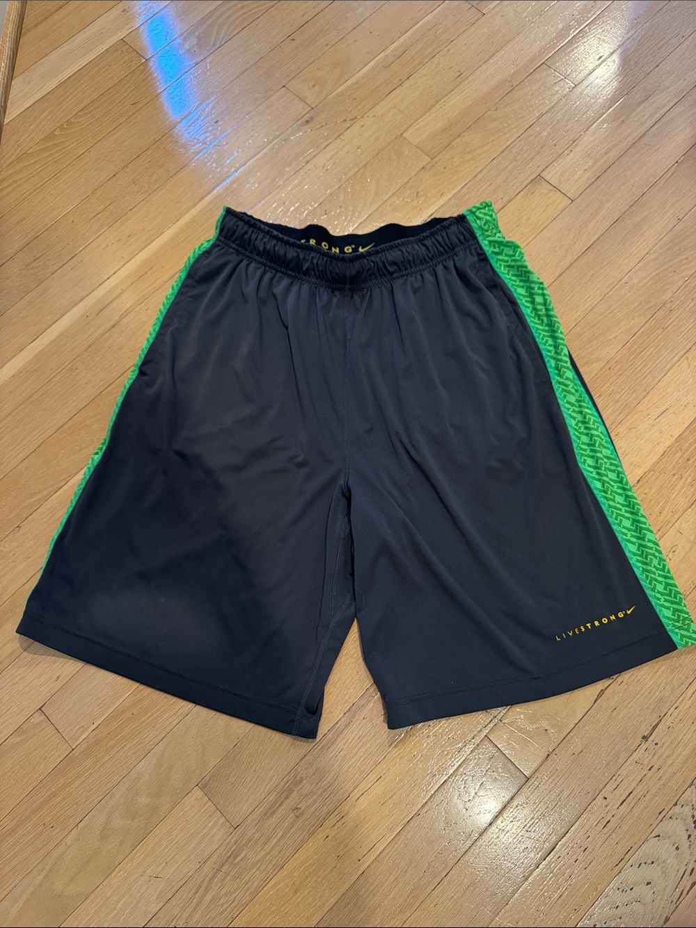 Men’s NIKE Black Athletic Shorts with Green Side Panels Size L Dri-fit
